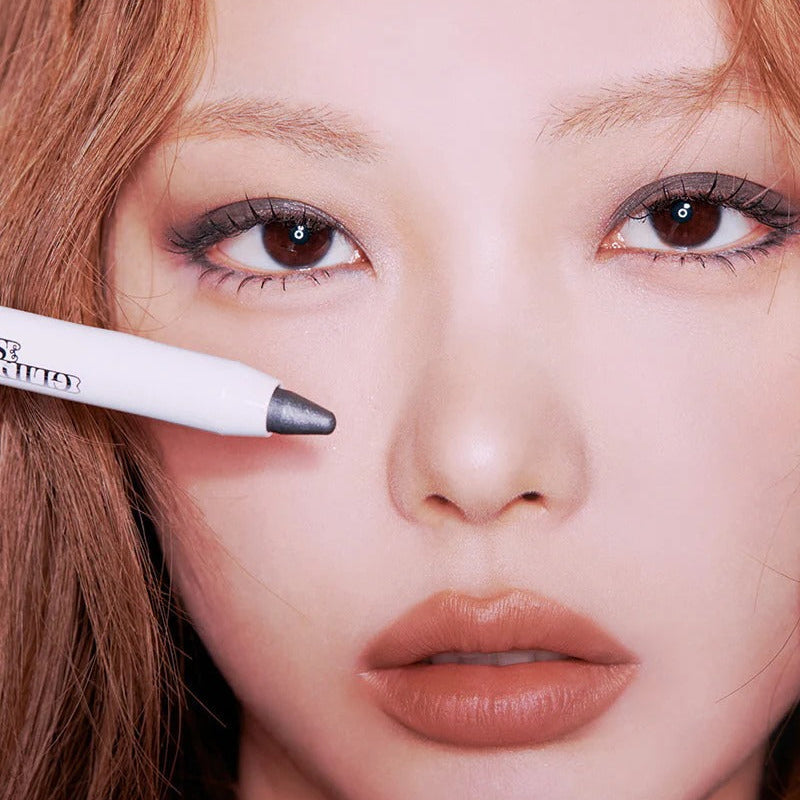 Model showcasing TIP TOE Glide Shadow Stick applied on eyes