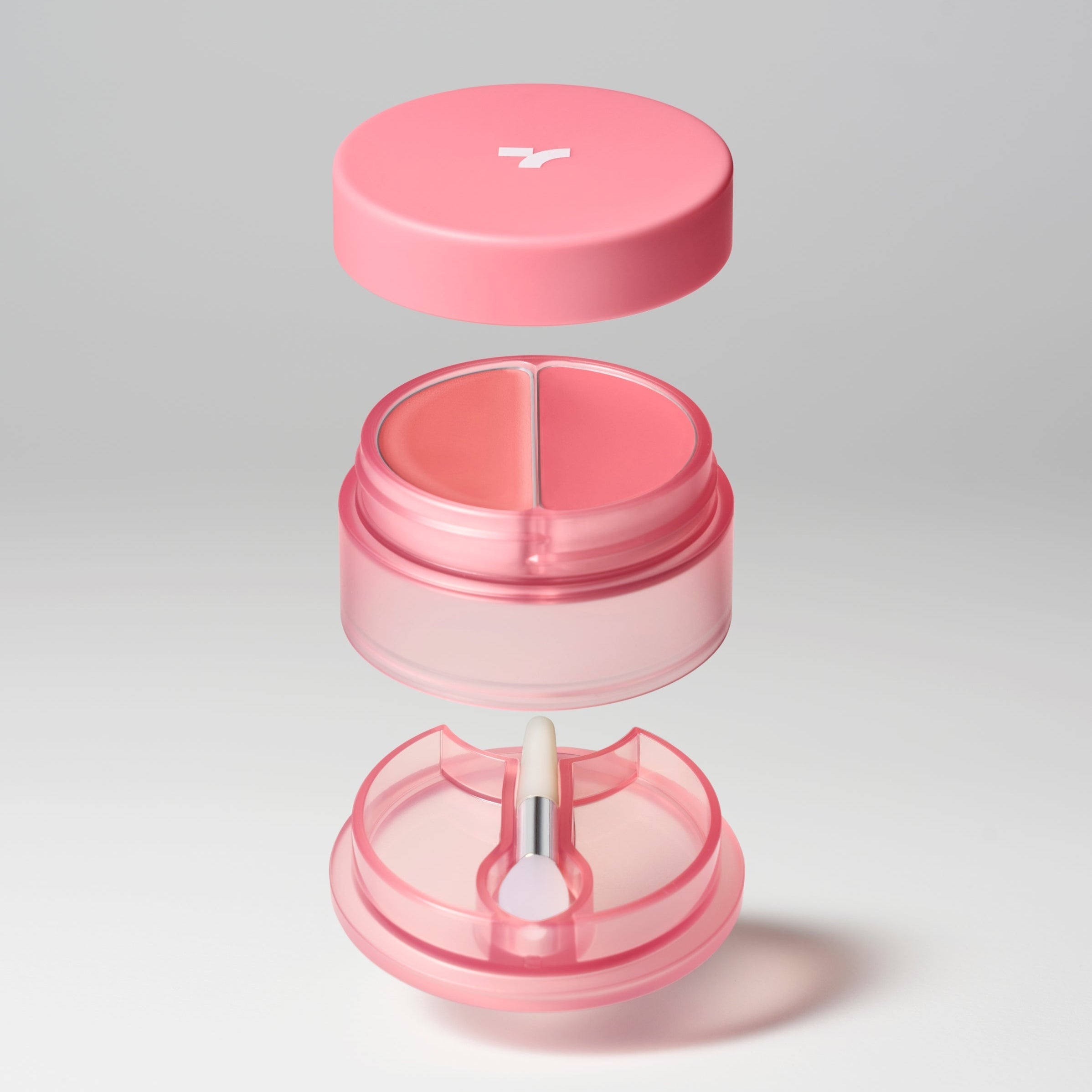 Open TONY MOLY Cheek Tone Lip & Cheek Duo Balm container showing pink shades and applicator