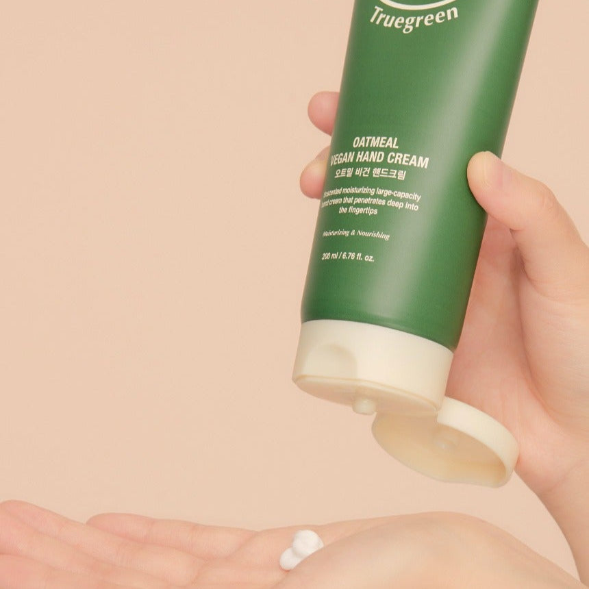 Applying TONYMOLY Truegreen Oatmeal Vegan Hand Cream 200ml to hand.