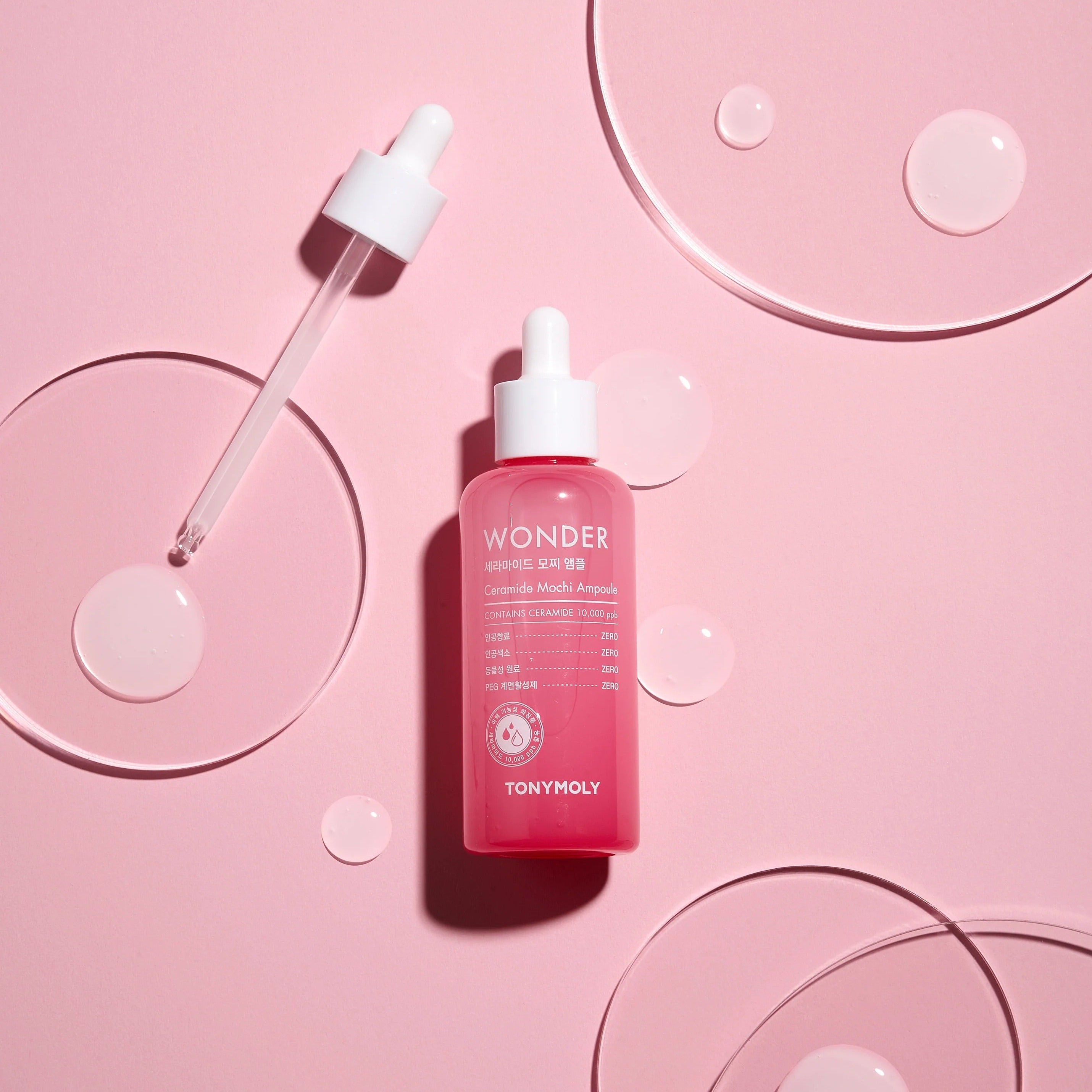 TONYMOLY Wonder Ceramide Mochi Ampoule 100ml pink bottle with dropper on pink background