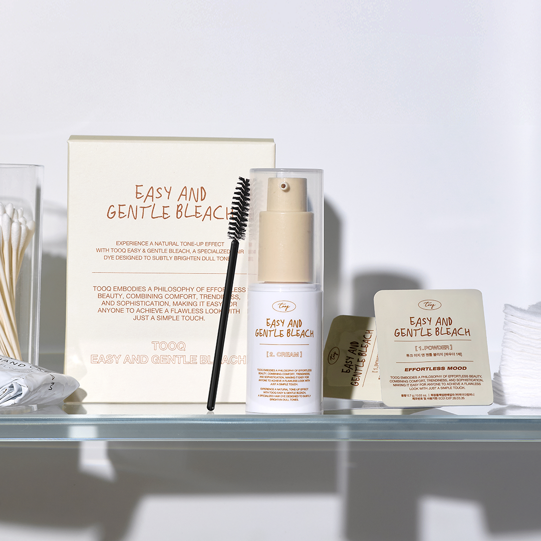 TOOQ Easy And Gentle Bleach displayed with applicator and product packaging.