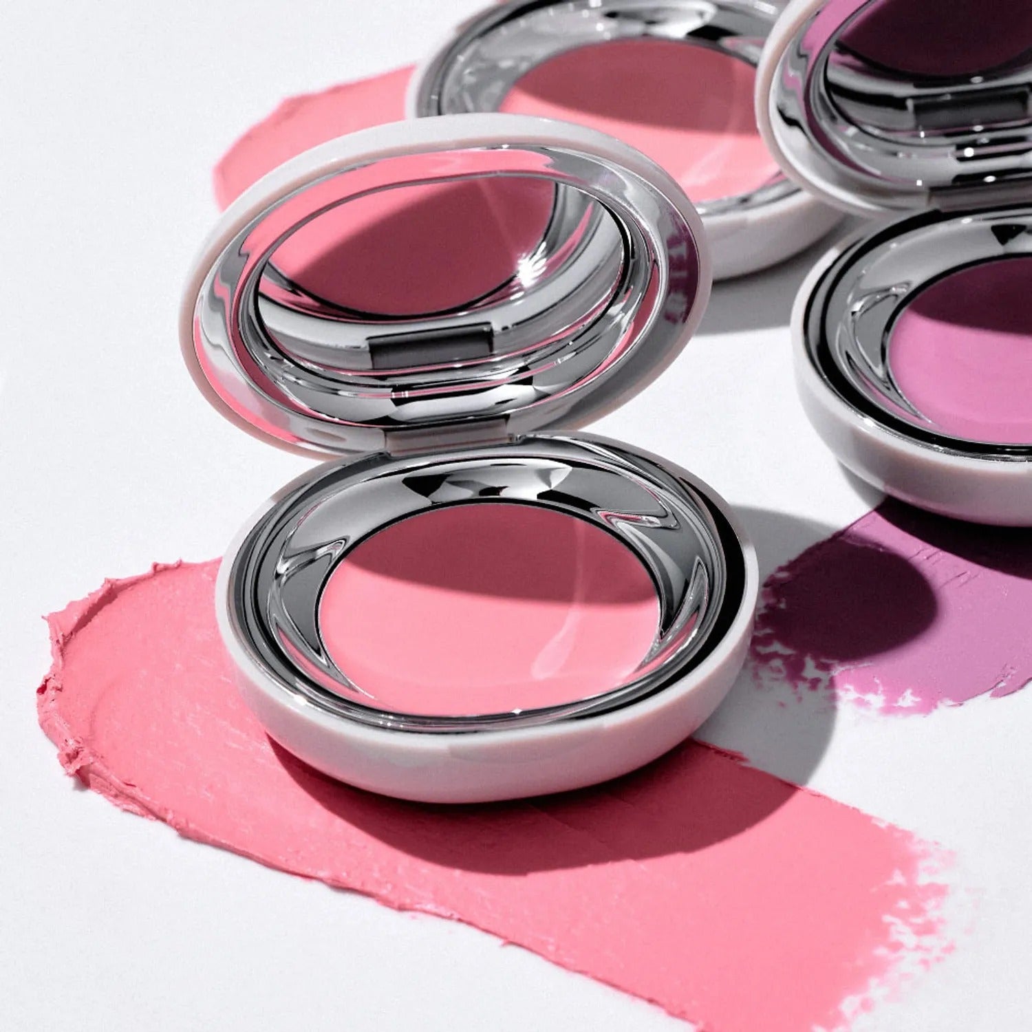 TOOQ Satin Peach Blossom makeup compact with vibrant pink shades in elegant packaging
