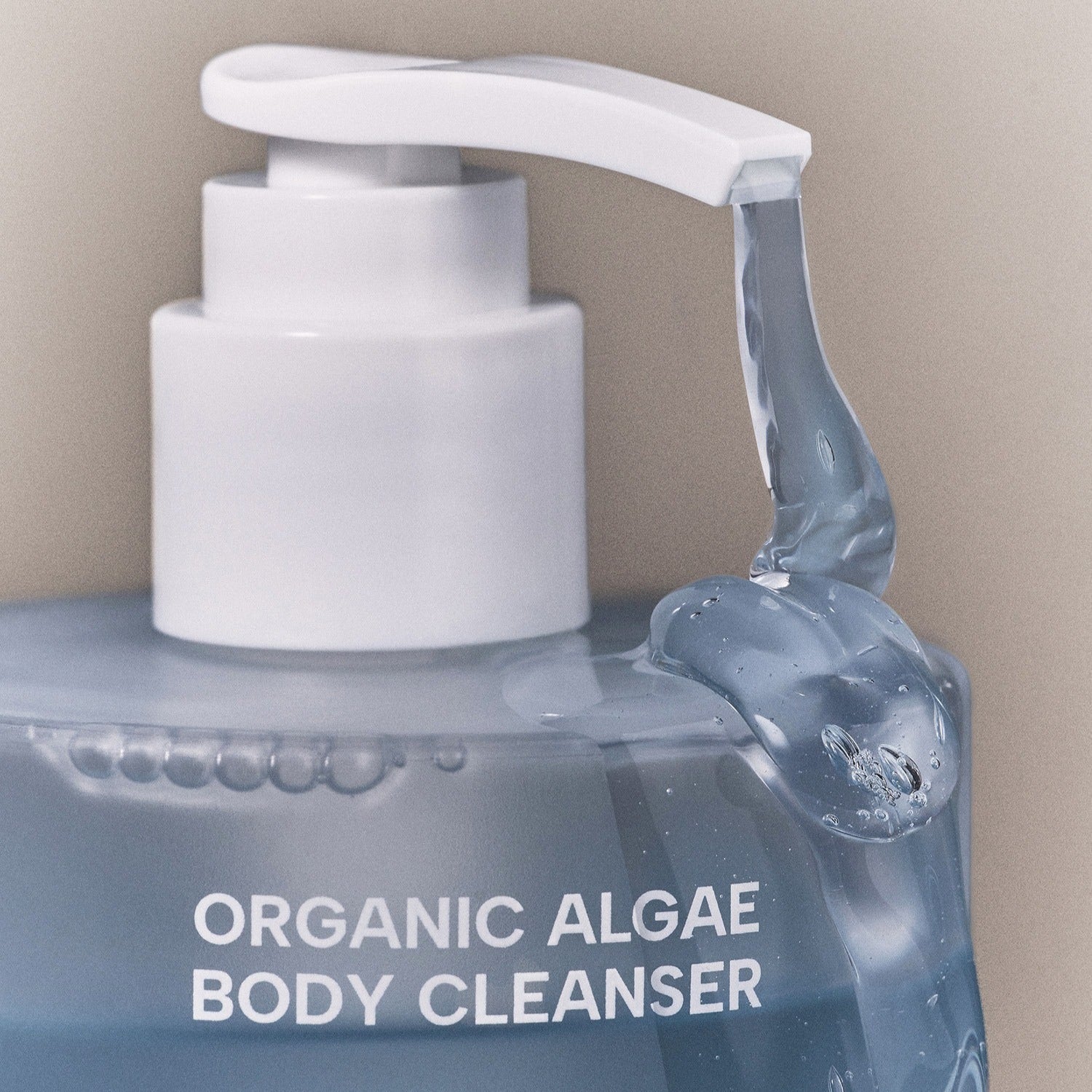 WHAMISA Organic Algae Fermented Body Cleanser 490ml bottle with pump showing texture of cleanser