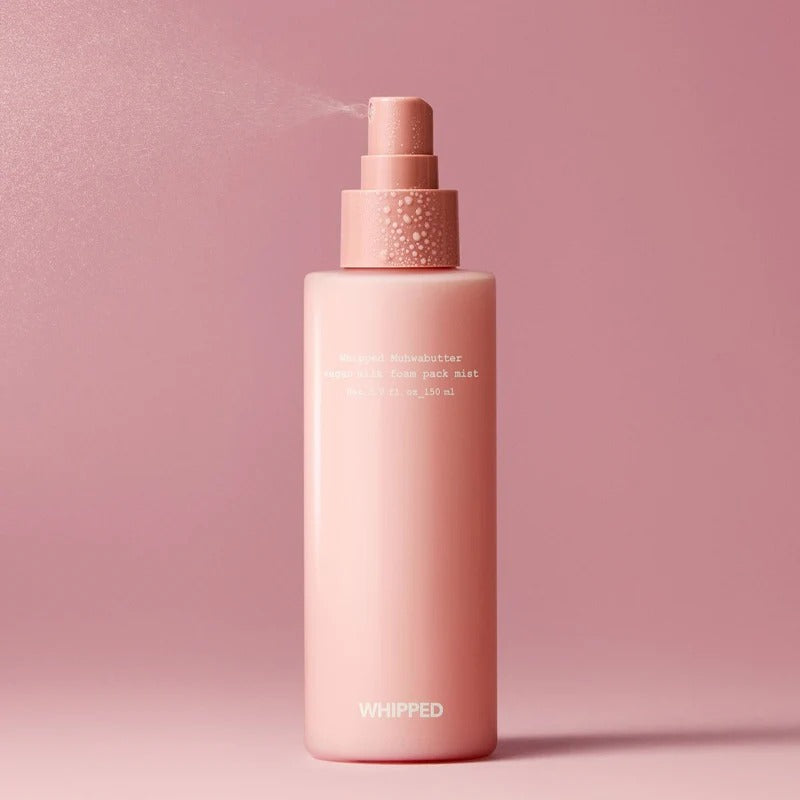 WHIPPED Butter Vegan Milk Foam Pack Mist 150ml in pink spray bottle on pink background