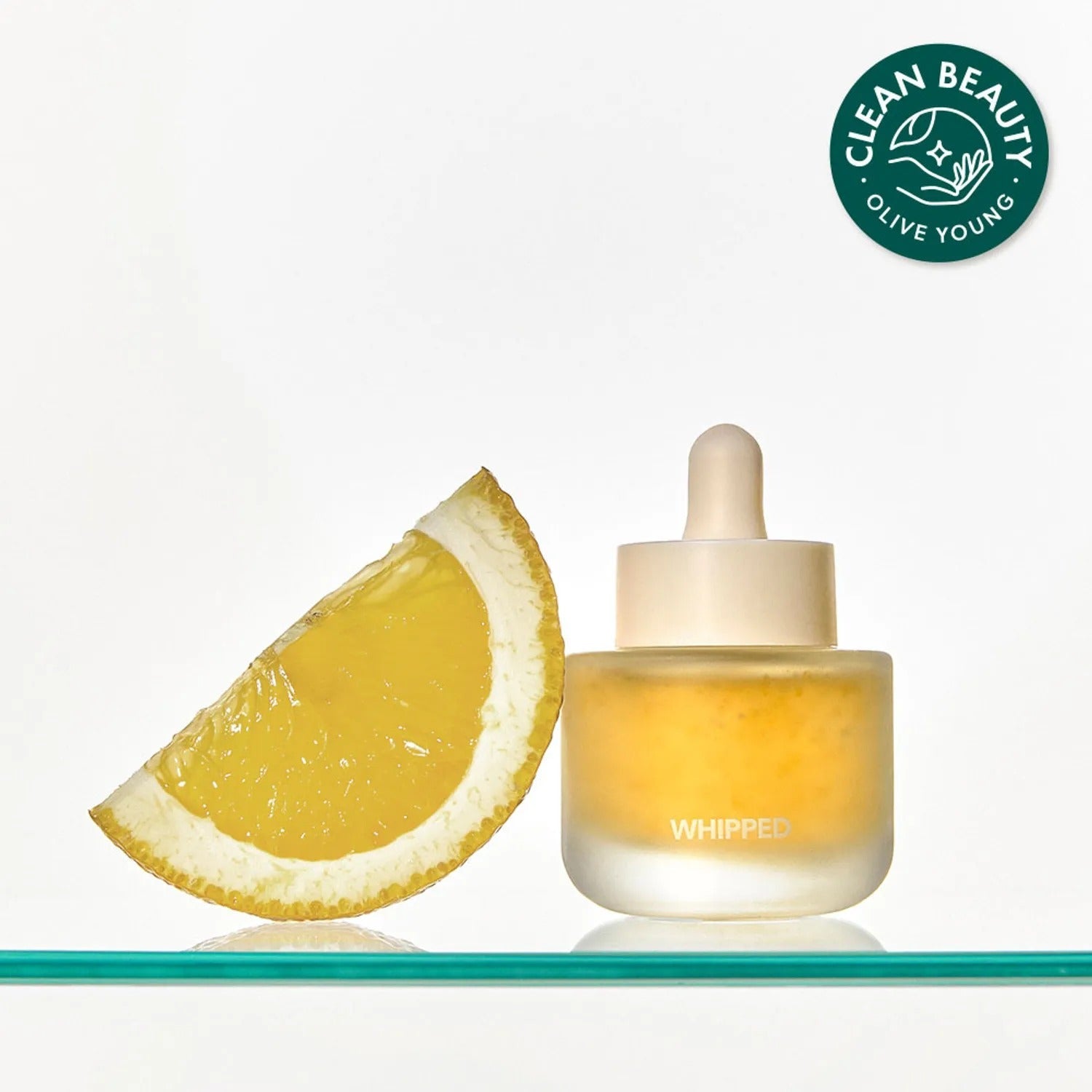 WHIPPED Yujamong Vegan Vita Syrup Ampoule 30ml with lemon slice and Clean Beauty Olive Young certification.