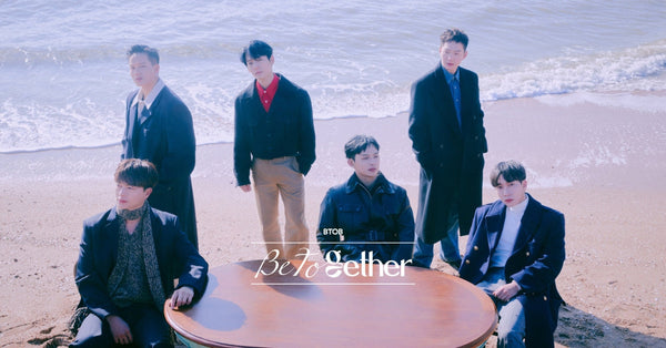 BTOB: The K-Pop Boy Band That Keeps on Beating, members posing on the beach for Be Together album shoot.