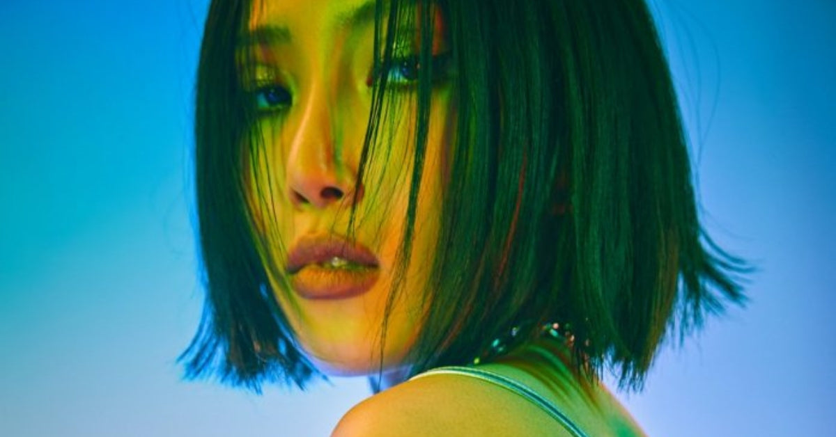 Hwasa the Irresistible Charm of K-Pop's Bold Star in a vibrant portrait
