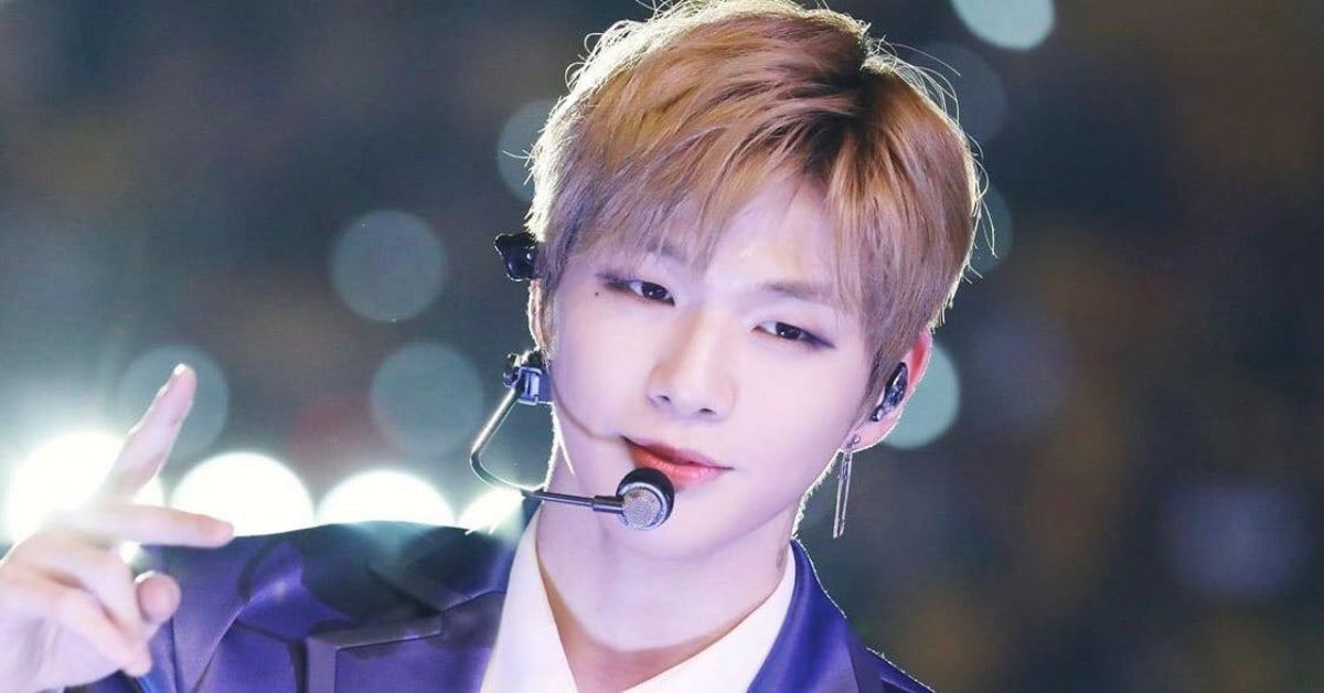 K-pop icon Kang Daniel performing on stage, showcasing why he's known as the "King of K-Pop Cool". Get to Know KANG DANIEL: The King of K-Pop Cool!