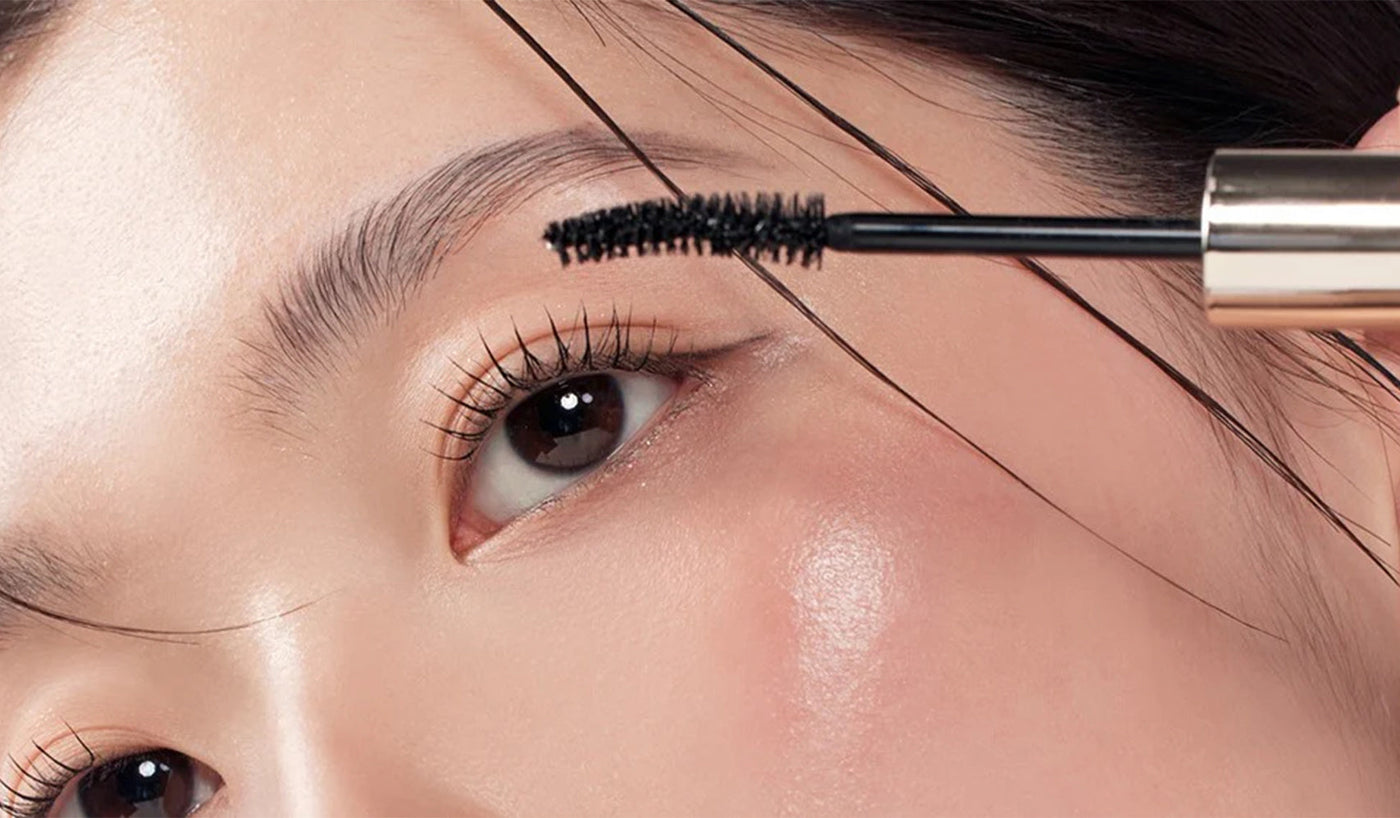 Elevate Your Beauty Routine with MARSHIQUE: A Luxury Brand Unveiled showcasing premium mascara application