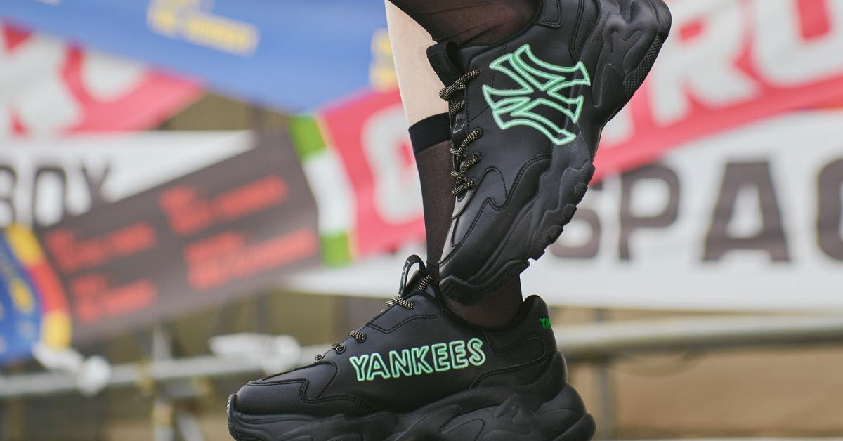 Step Up Your Style Game: Discover MLB Korea Fashion! - Trendy black MLB Korea sneakers with neon accents.
