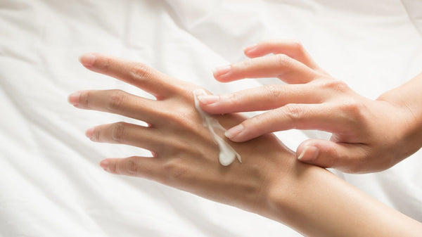 Applying skincare cream on hands, Discovering the Essence of Minimalism: The Beauty of Type NO Skincare