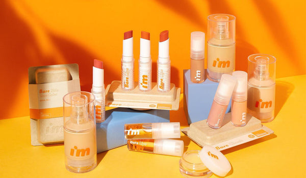 Discover the Charm of I'M MEME: A New Wave in Korean Cosmetics, featuring colorful lipsticks and skin products on display.