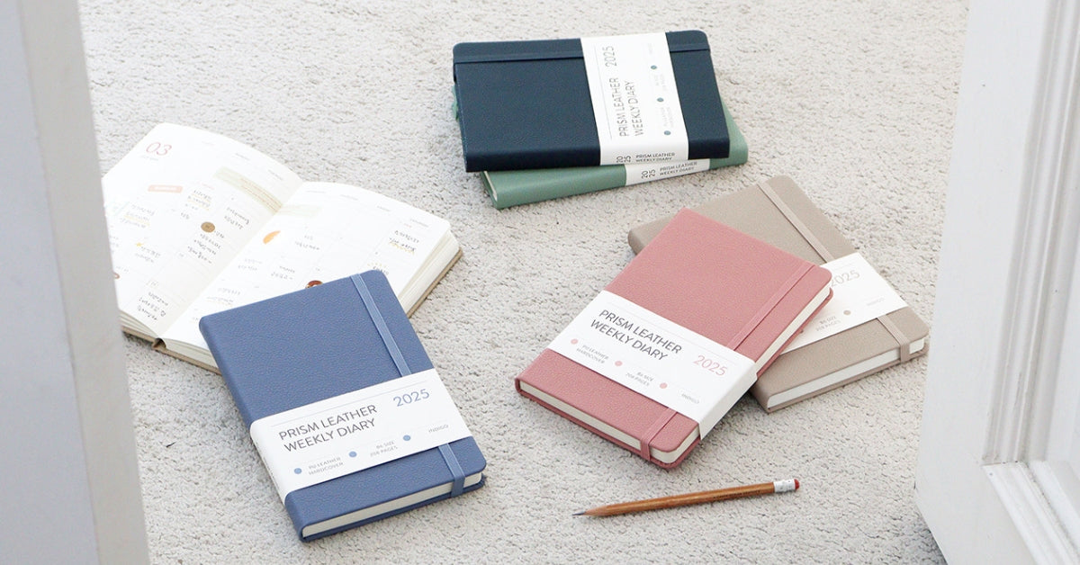 Indigo Korea: Your Ultimate Destination for Trendy Study Supplies! Featuring colorful planners and diaries on a cozy carpet.