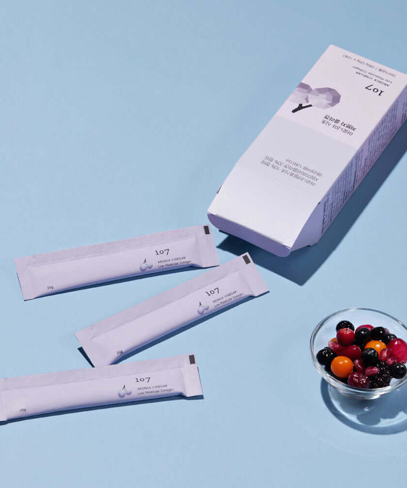 107 Aronia Vinegar Low Molecular Collagen 20g x 14 Packets shown with aronia berries on a blue background.