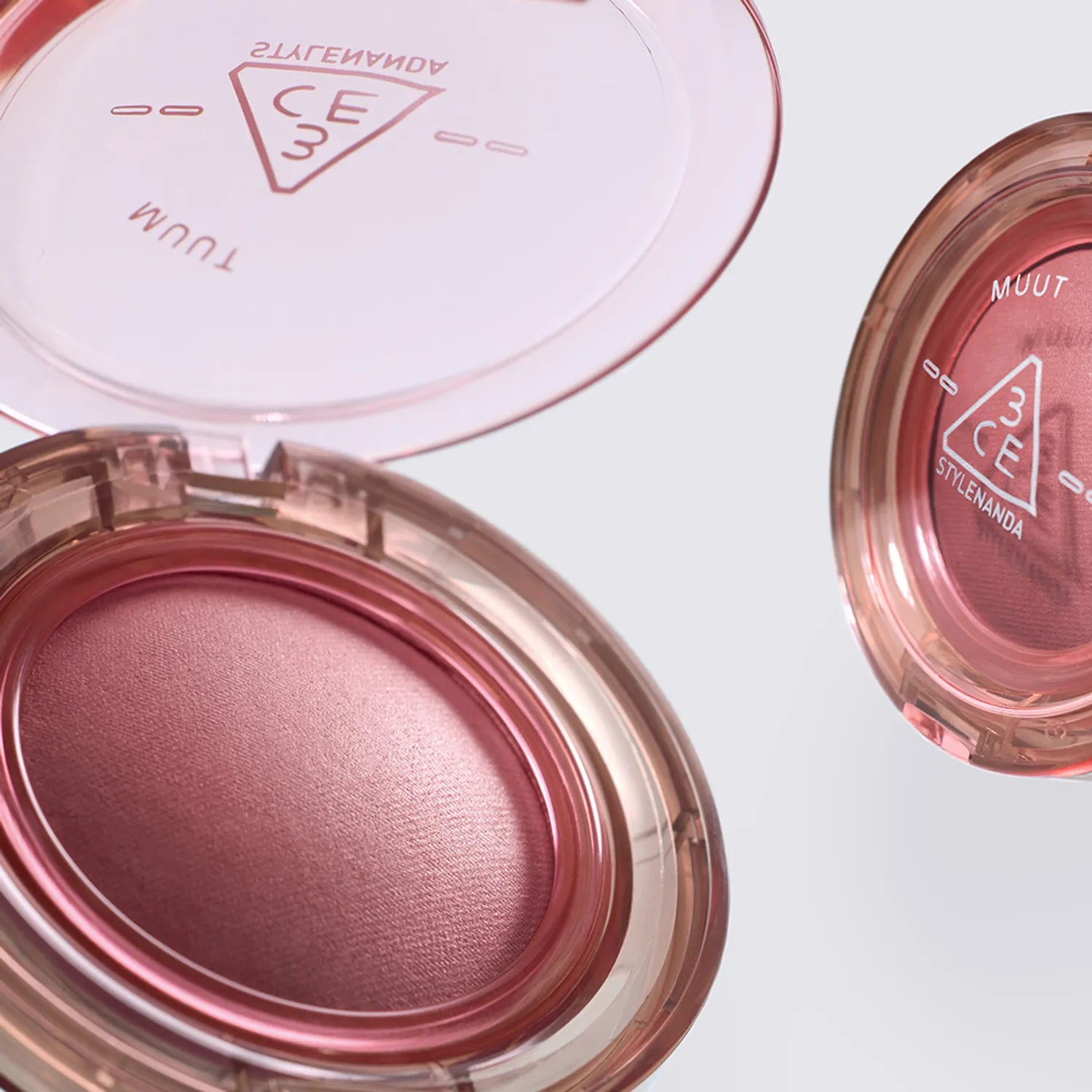 3CE Bouncy Blur Balm in pink, showcasing its smooth texture and compact design for easy application and travel.