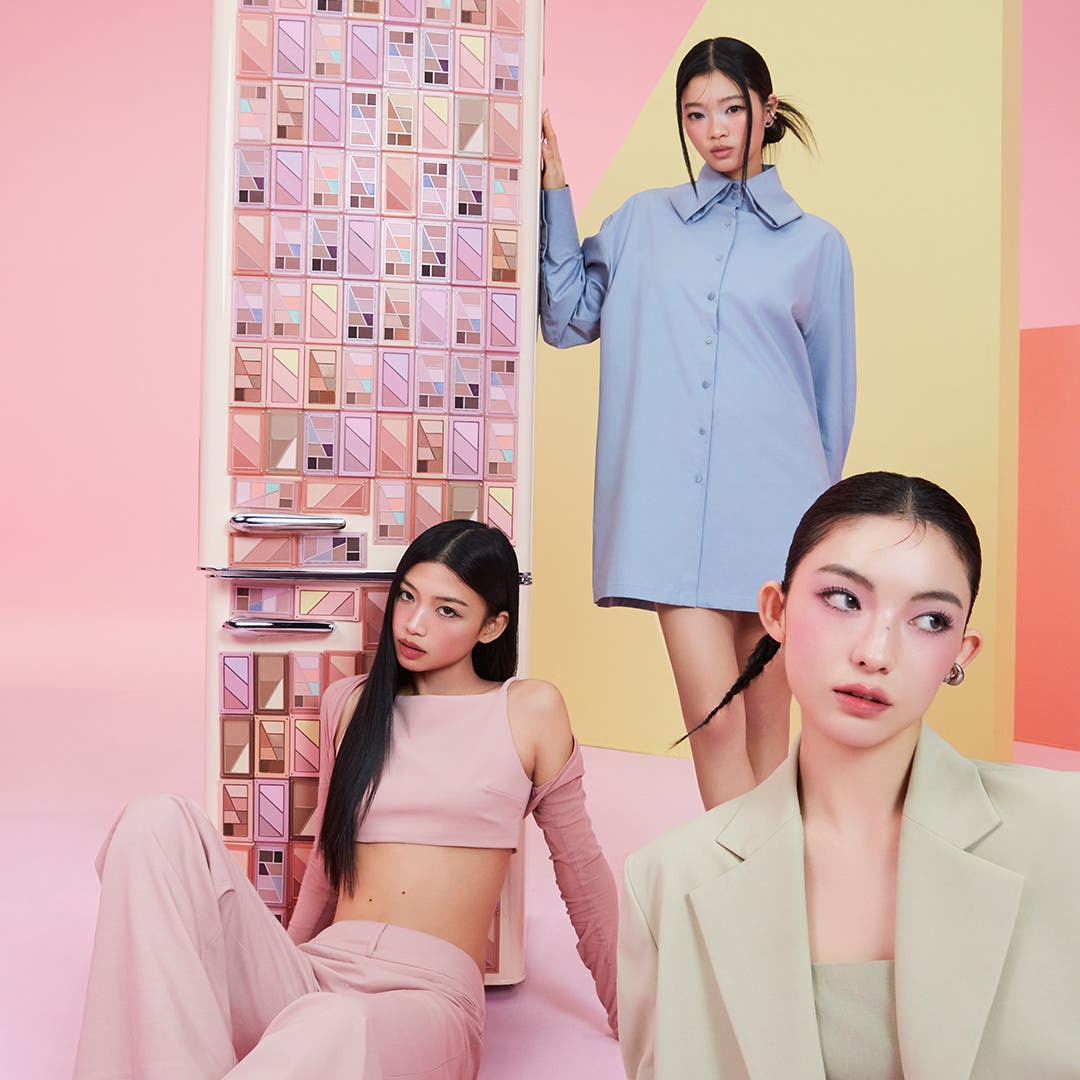 Models posing with 3CE Layer It All Blush Palette 10.5g display backdrop, showcasing fashion and makeup coordination.