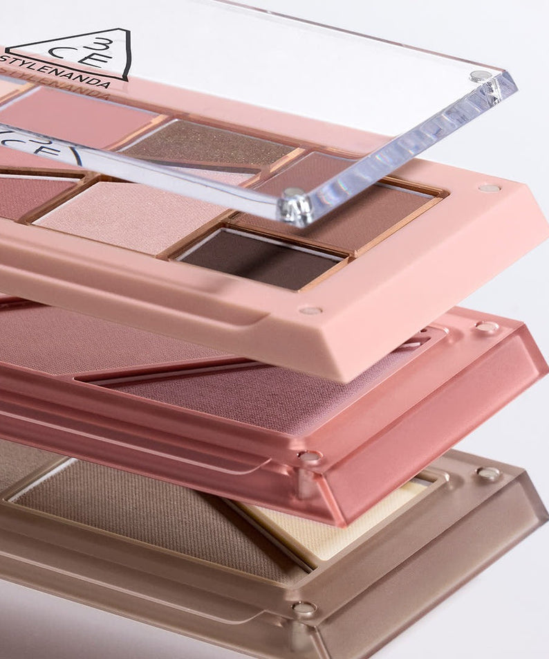 Close-up of the 3CE Layer It All Contour Palette 9.5g showcasing its diverse shades in elegant packaging.