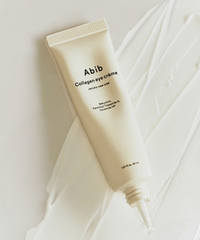 ABIB Collagen Eye Cream Resurrection Herb Tube 30ml on a creamy textured surface