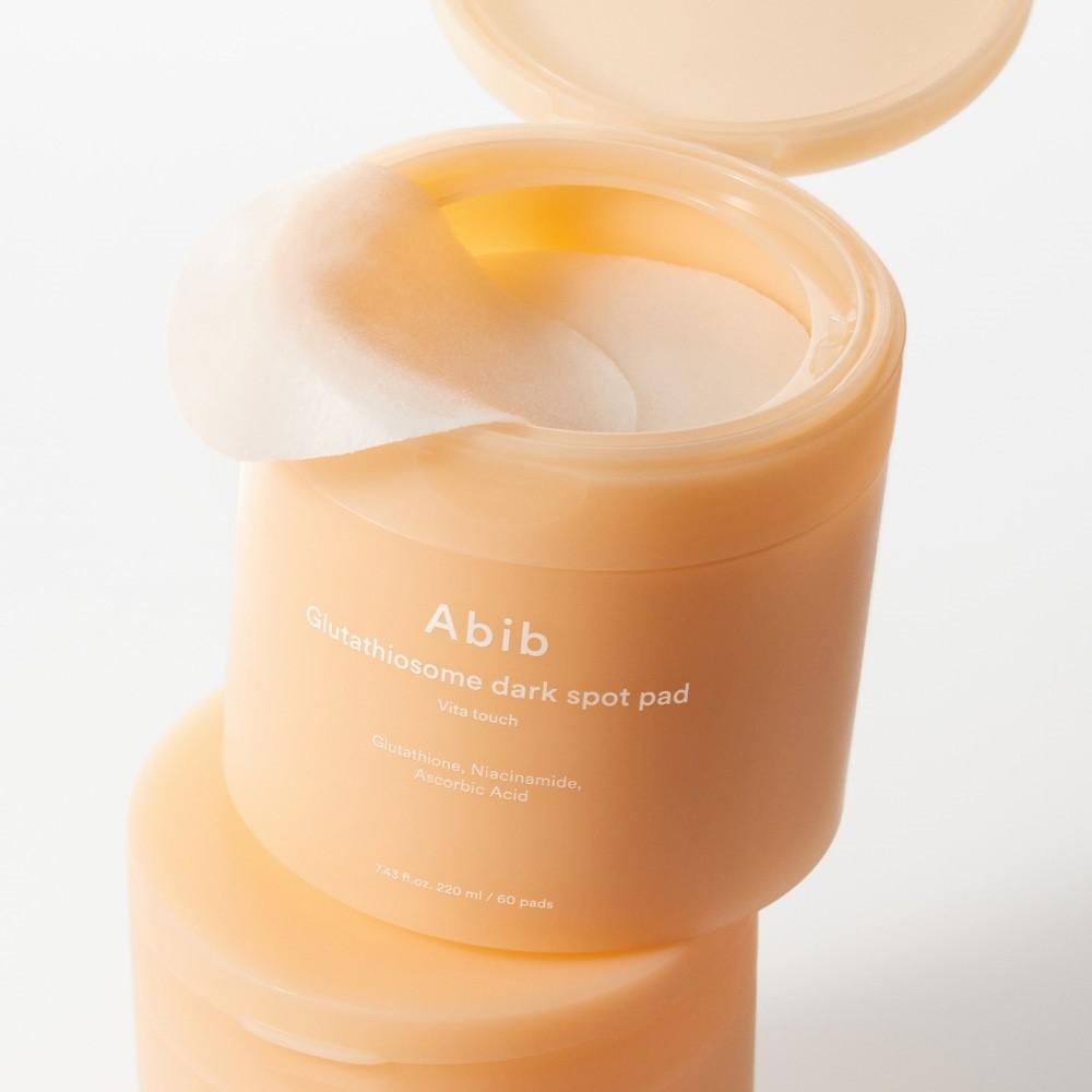 ABIB Glutathiosome Dark Spot Pad Vita Touch 60 EA jar with open lid and pads visible