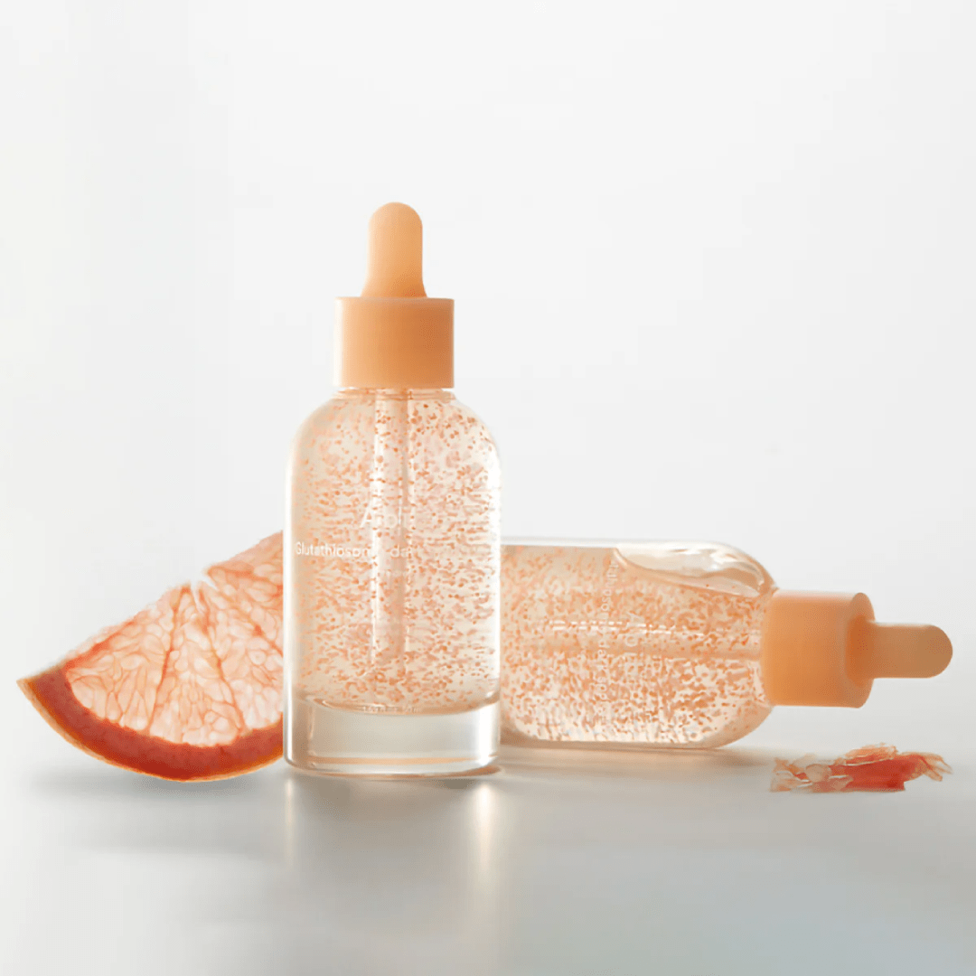 ABIB Glutathiosome Spot Serum Vita Drops 50ml with citrus slice on clean background