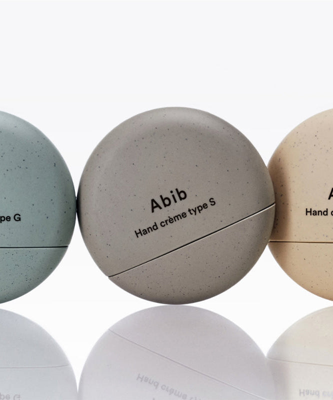 ABIB Hand Cream 3 Types displayed in round containers, featuring type G, S, and T. High-quality skincare for soft, moisturized hands.