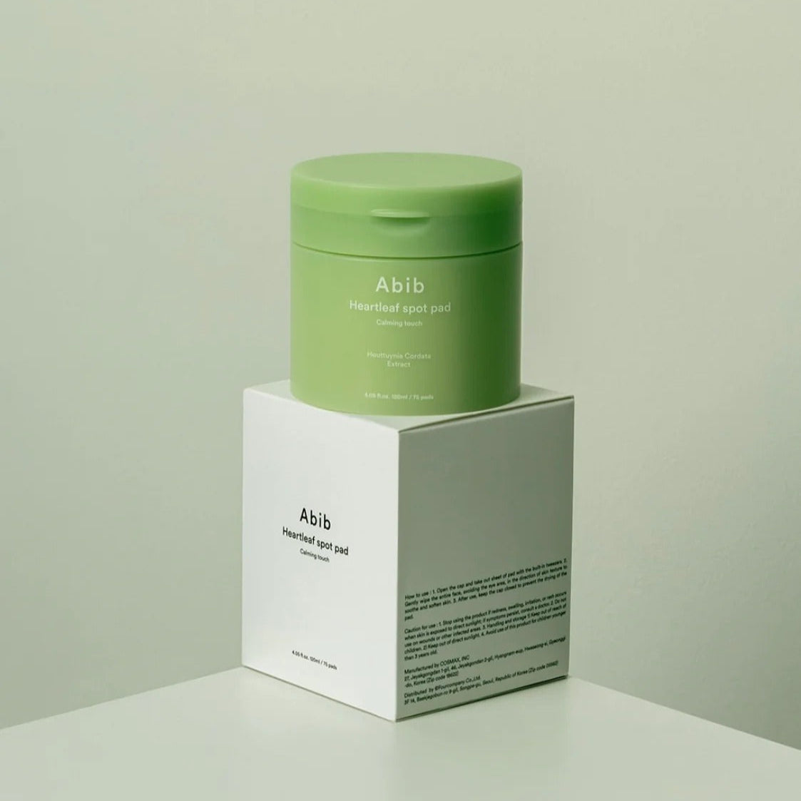 ABIB Heartleaf Spot Pad Calming Touch 70 pads packaging on display, showcasing skincare product design and branding.