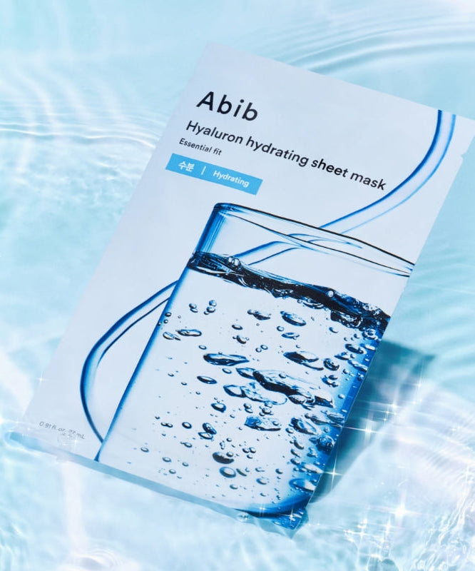 ABIB Hyaluronic Acid Moisture Sheet Mask Essential Fit packaging on a watery background