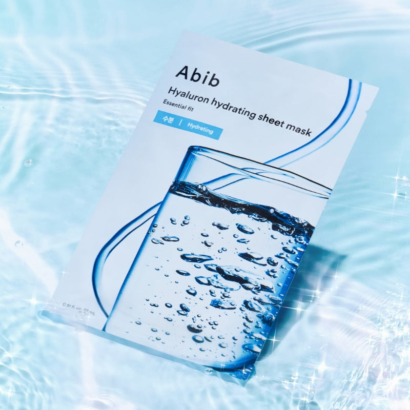 ABIB Hyaluronic Acid Moisture Sheet Mask Essential Fit packaging on a watery background
