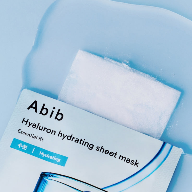 ABIB Hyaluronic Acid Moisture Sheet Mask Essential Fit package on a blue background, showcasing the product design and features.