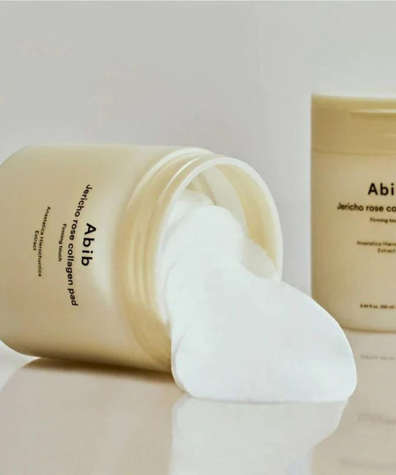 ABIB Jericho Rose Collagen Pad Firming Touch 60 Pads, beauty product with skincare benefits, displayed with open container on a white background.