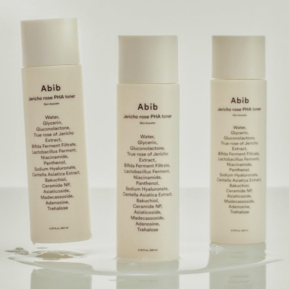 Three bottles of ABIB Jericho Rose PHA Toner Skin Booster 200ml with ingredient list visible on the labels.