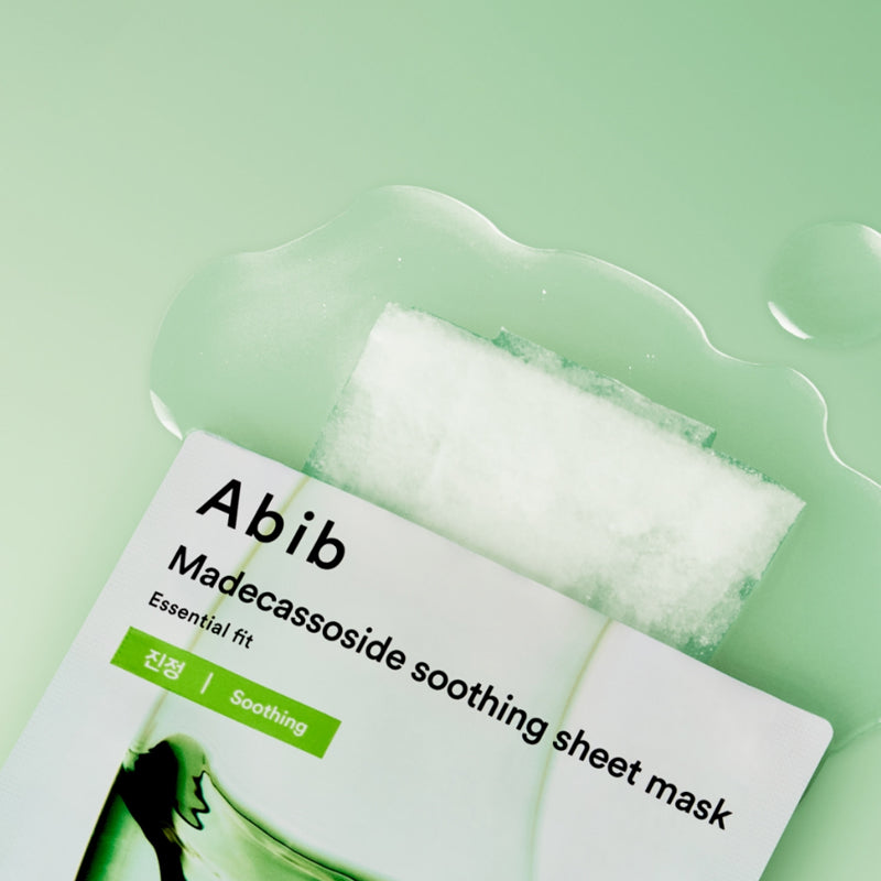 ABIB Madecassoside Soothing Sheet Essential Fit on a green background