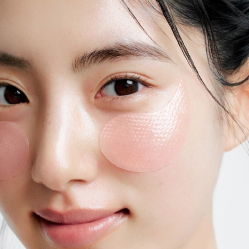 Close-up of a woman wearing ABIB PDRN Retinol Eye Patch Glow jelly 30 Pairs, showcasing skin care benefits for under-eye area.