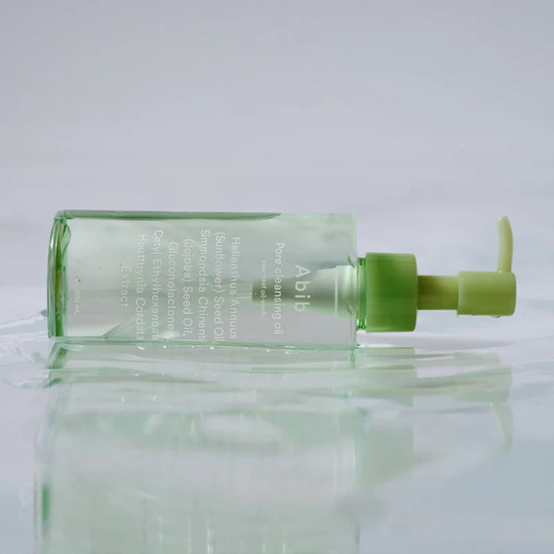ABIB Pore Cleansing Oil Heartleaf Oil-Wash 200ml on reflective surface with green pump