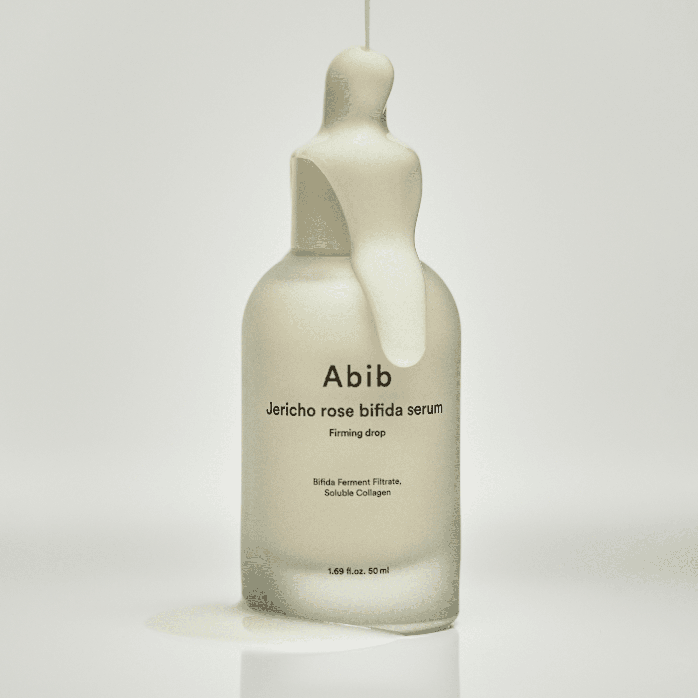ABIB Resurrection Bifida Serum Firming Drops 50ml with liquid texture, emphasizing its firming properties and luxurious formulation.