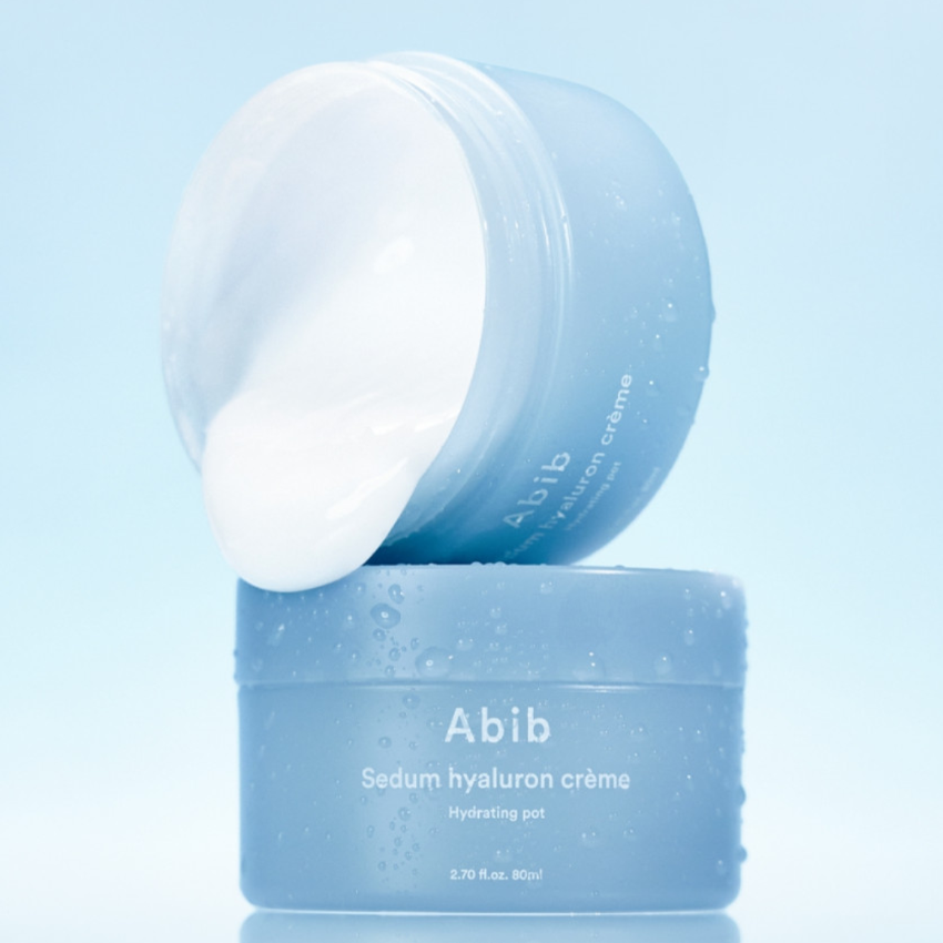 ABIB Sedum Hyaluron Creme Hyadrating Pot 80ml displayed with open lid and creamy texture on light blue background