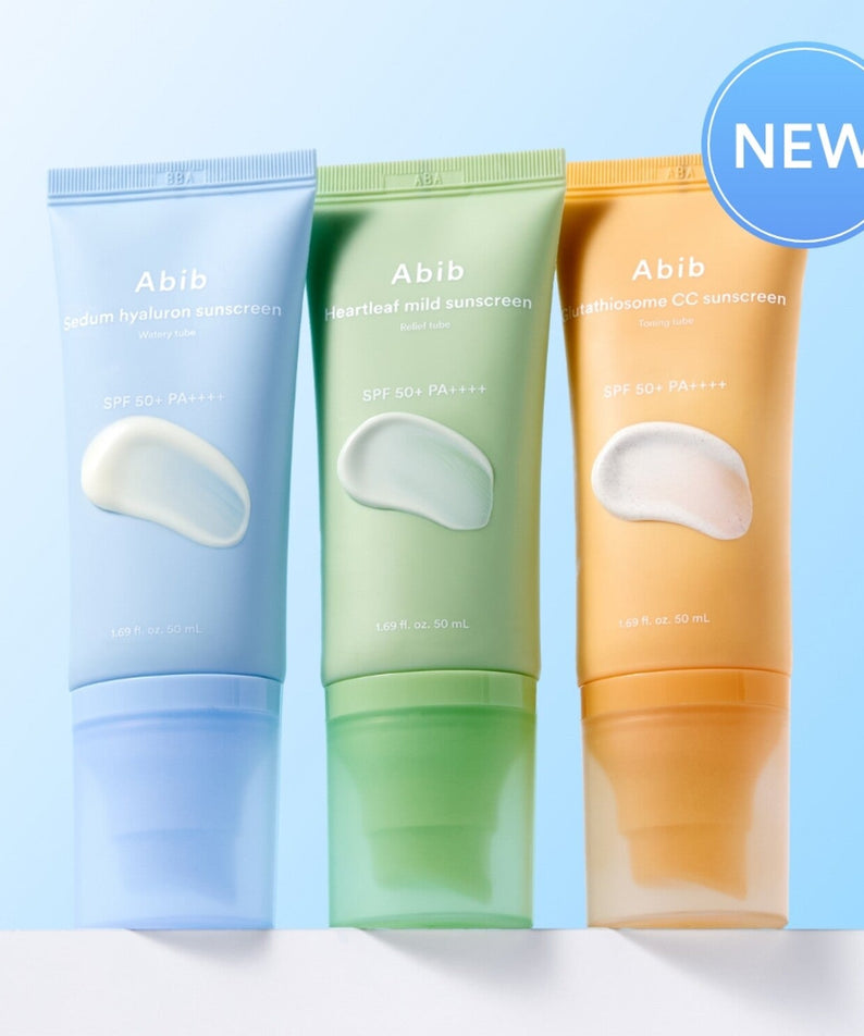 ABIB Sunscreen Tube 50ml 3 Types displayed in different colors against a blue background, highlighting new skincare product release.