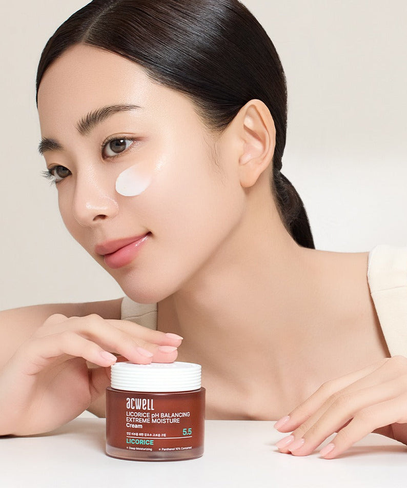 Model applying ACWELL Licorice pH Balancing Extreme Moisture Cream 55ml to her face for smooth, hydrated skin.