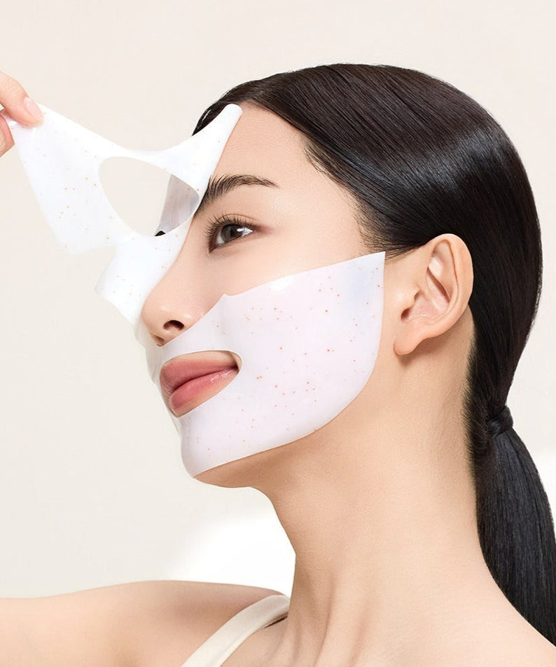 Woman applying ACWELL Licorice pH Balancing Real Toning Capsual Mask Sheets 4ea on her face