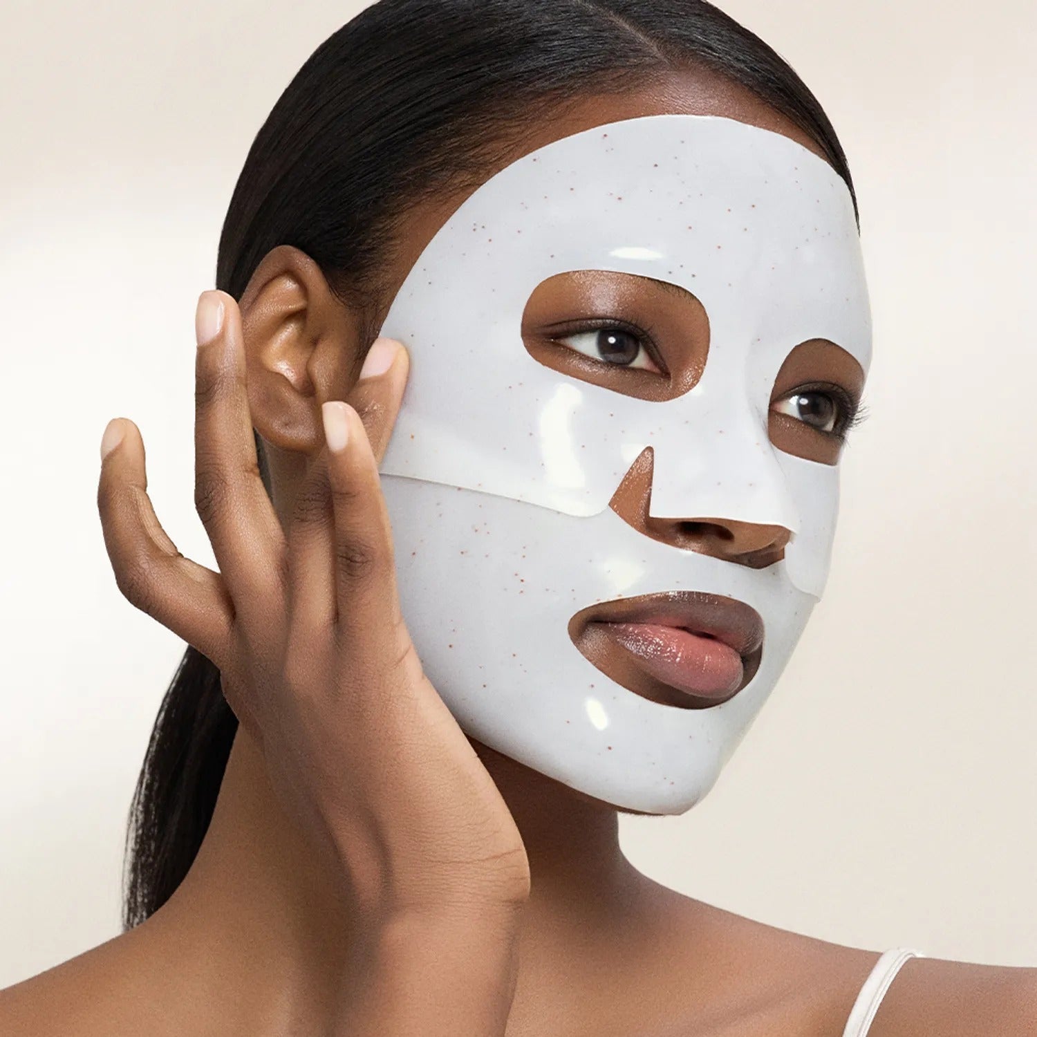 Woman wearing ACWELL Licorice pH Balancing Real Toning Capsual Mask Sheets 4ea for skin toning and hydration