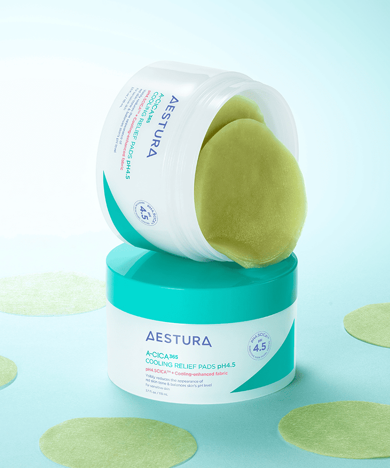 AESTURA Acica 365 Cooling Relief Pad pH 4.5 110ml (60 sheets) for soothing skin, shown in open container with pads exposed on blue surface.