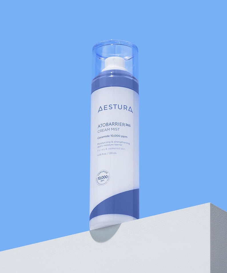 AESTURA Atobarrier 365 Cream Mist 120ml bottle on a minimalist background, highlighting skincare product packaging and design.