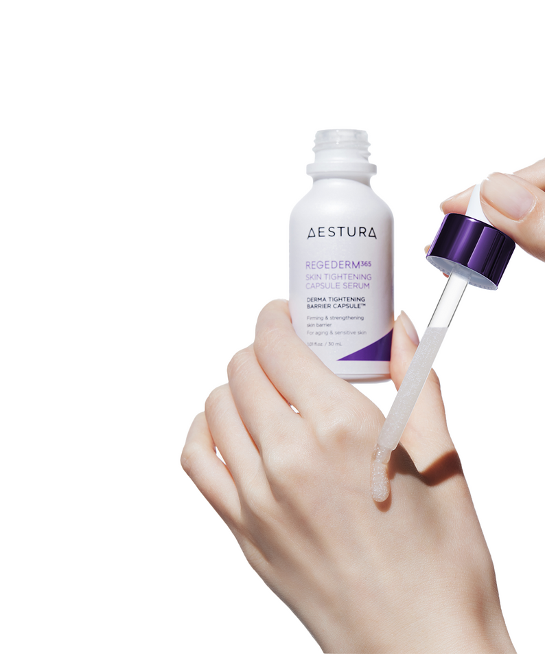 AESTURA Rizederm 365 Skin Tightening Capsule Serum 30ml being applied with a dropper on hand for effective skincare