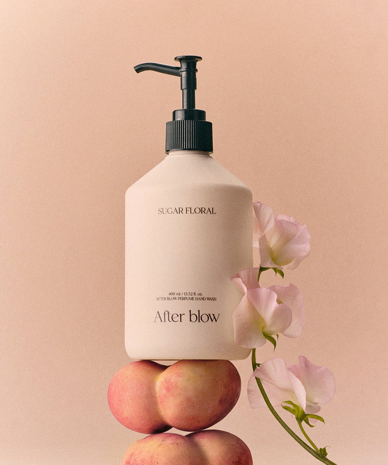 AFTER BLOW Perfume Hand Wash Sugar Floral 400ml bottle with floral backdrop
