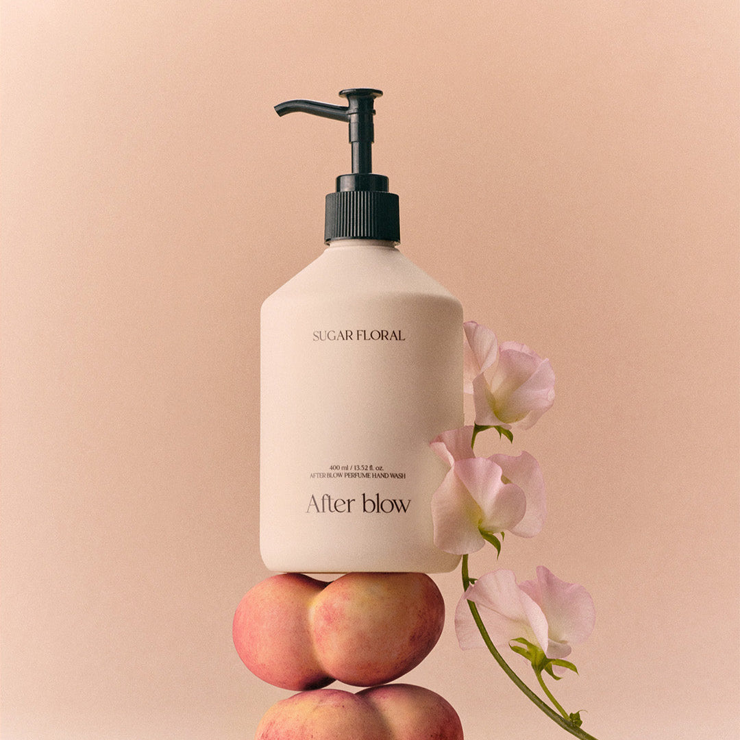 AFTER BLOW Perfume Hand Wash Sugar Floral 400ml bottle with floral backdrop