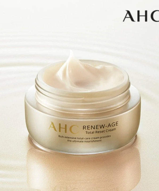 Open jar of AHC Renew Age total Reset Cream 50ml on water background