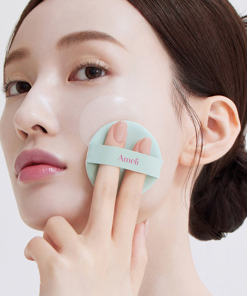Model using AMELI Complement Series Cushion SPF42 PA++ Green for smooth complexion