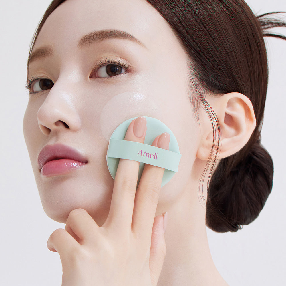 Model using AMELI Complement Series Cushion SPF42 PA++ Green for smooth complexion