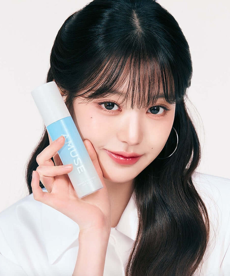 Woman holding AMUSE Ceramic White Pearl Rice Mist & Fixer 80ml