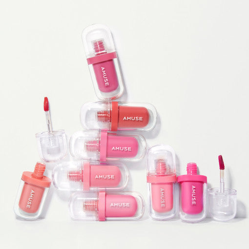 AMUSE Jel-Fit Tint collection of vibrant pink and coral lip tints, displayed in clear cases.